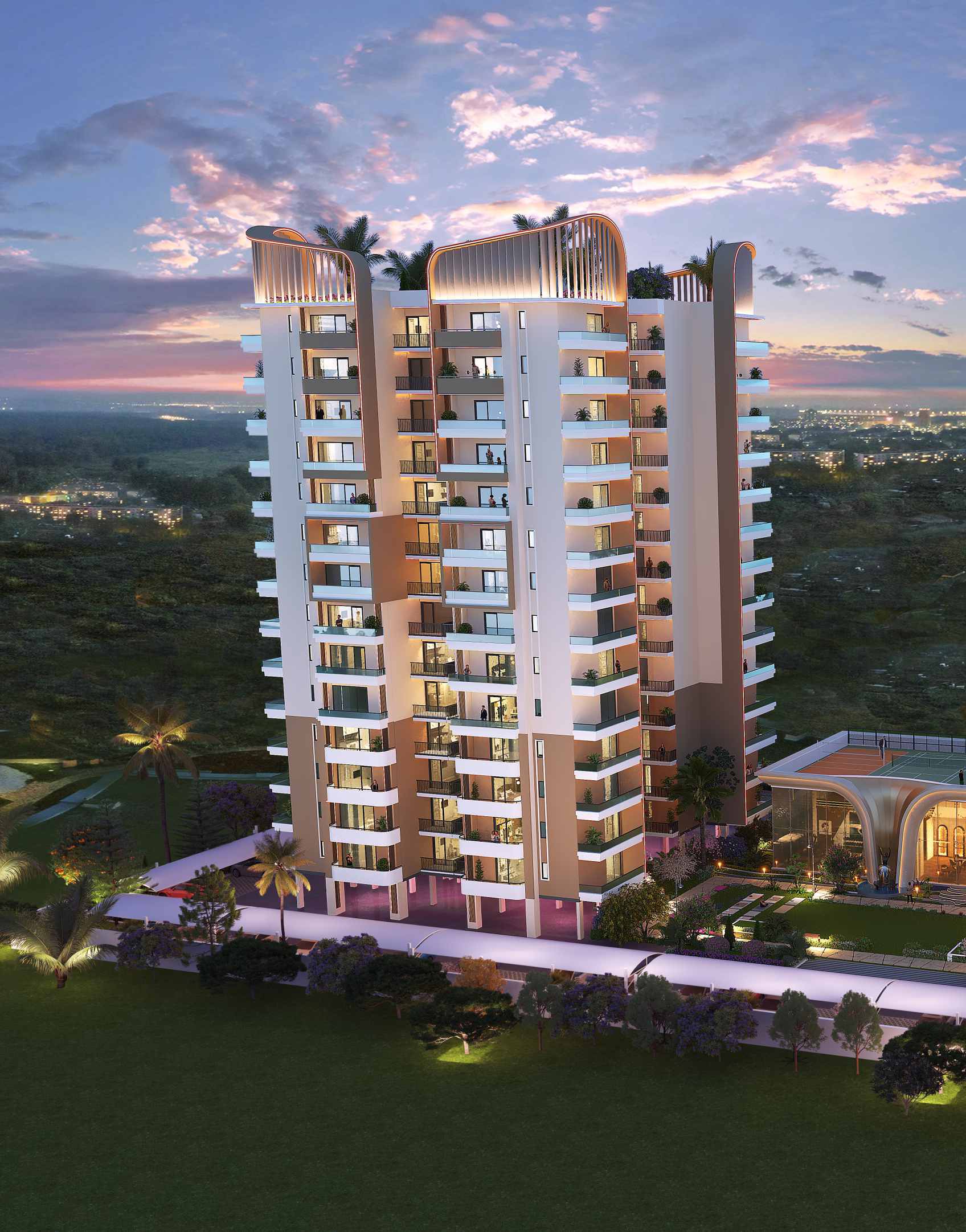 A tall modern residential tower with illuminated balconies, set against a sunset sky and green landscape.